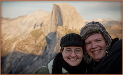 Jenny & Jeff at Yosemite Glacier Point with Half Dome behind